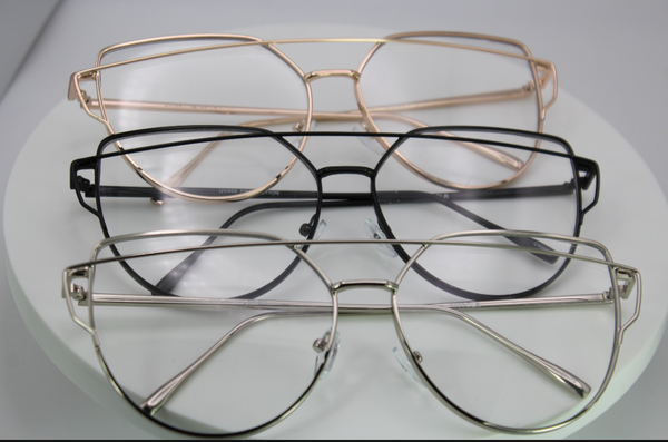Three pairs of Detroit brand Bellz Coutre eyeglasses with different frame colors on a white background