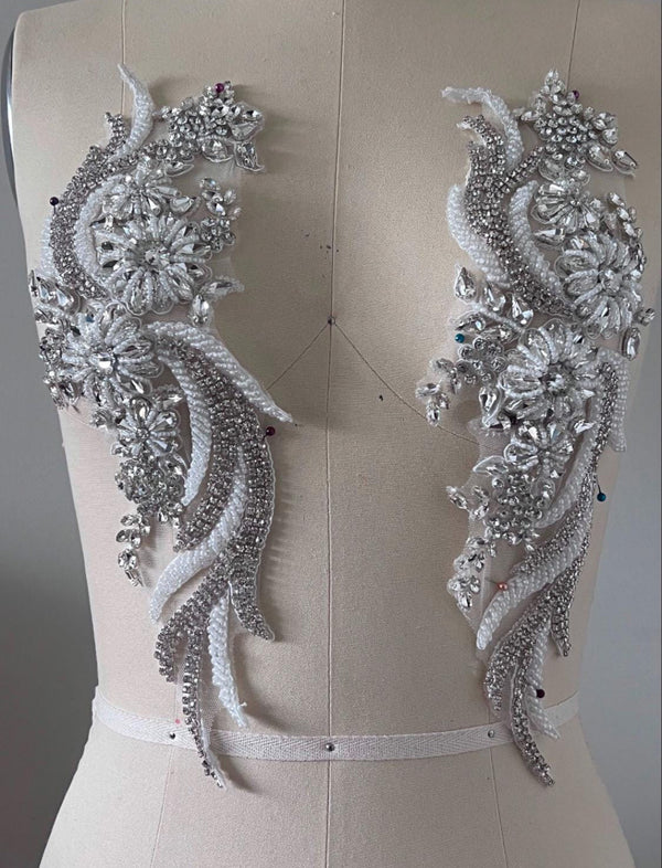 Decorative silver embellishments on a mannequin